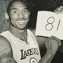 Mosaic artwork of a basketball player holding a sign with the number 81, wearing a Lakers jersey.