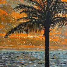 Palm tree silhouette against an orange sunset sky with water reflection