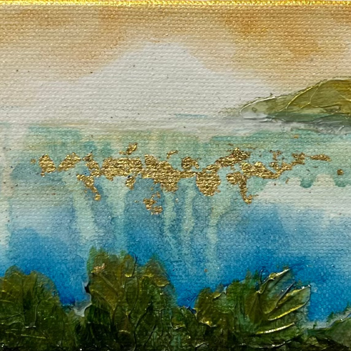 Scenic painting of a lake with mountains and trees