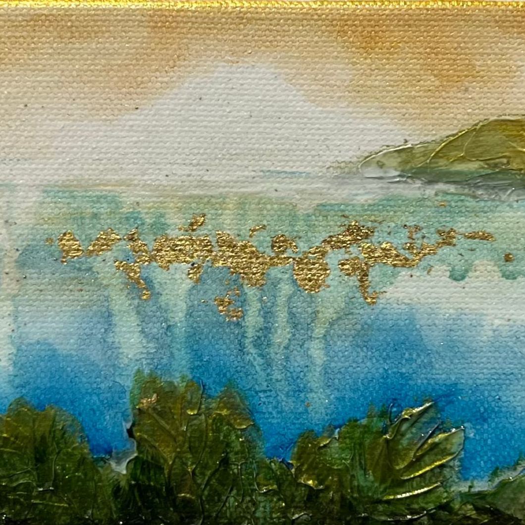 Scenic painting of a lake with mountains and trees