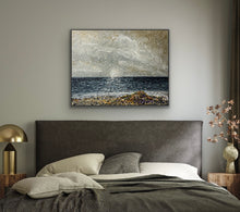 Bedroom with abstract painting of ocean and sky above bed