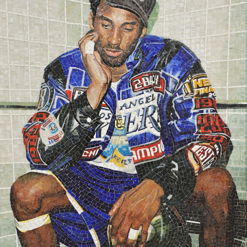 Mosaic artwork of a person wearing a colorful jacket and cap, sitting on a bench.