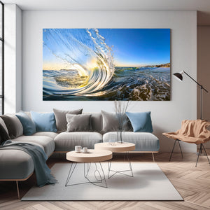 Modern living room with a large ocean wave painting on the wall.