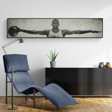 Modern interior with a blue lounge chair, black cabinet, and framed artwork of a athlete lifting weights.
