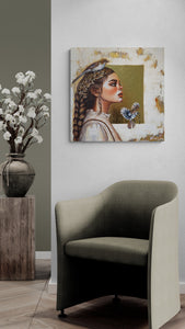 Modern interior with a chair, vase of flowers, and wall art.