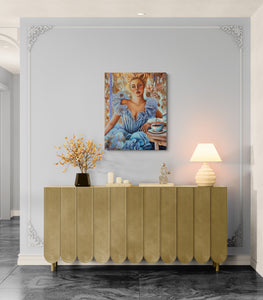 Gold sideboard against a gray wall with decorative elements