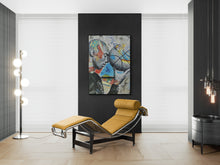 Modern interior with a yellow lounge chair, abstract painting, and floor lamp.